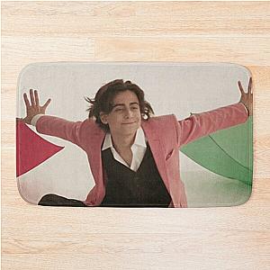 Aidan Gallagher pink jacket Bath Mat