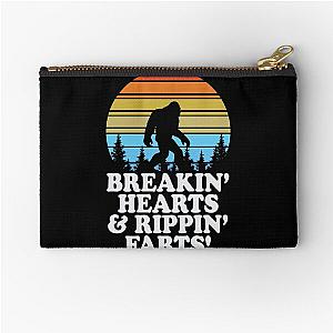 Funny Bigfoot at Sunset Rapping Farts Essential Zipper Pouch