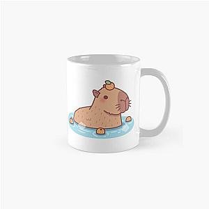 Cute Capybara With Orange On Head Chilling In Hot Spring Classic Mug