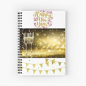 Cheers to the new year. Best wishes. Spiral notebook.