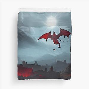 Red dragons flying over a medieval town duvet cover