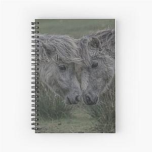 Two wild foals with their heads together Spiral Notebook