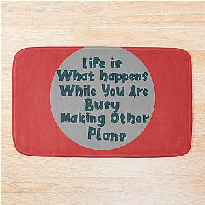 John Lennon quote - Life is what happens Bath Mat