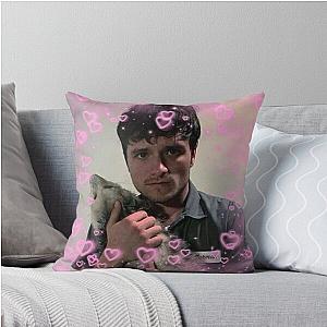 Josh Hutcherson with an opossum throw pillow
