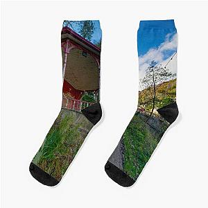 Lovers Walk Matlock Bath Socks

After re-examining the title, I found that there were no duplicate words in sequence, but I can try to suggest a better cleaned-up version: 

Lovers Walk in Matlock Bath Socks