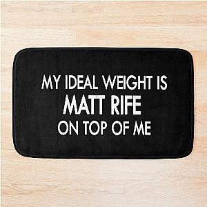 My ideal weight is Matt Rife on a black white bath mat