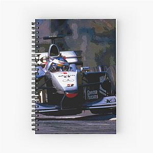Mika Hakkinen racing his 1999 MP4-14 F1 racecar notebook