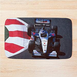 Mika Hakkinen racing his 1999 MP4-14 F1 racecar from above Bath
