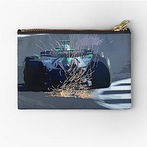 Nico Hulkenberg racing to his first podium at Silverstone during the 2025 British Grand Prix from the rear with sparks