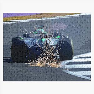 Nico Hulkenberg racing to his first podium at Silverstone during the 2025 British Grand Prix from the rear with sparks