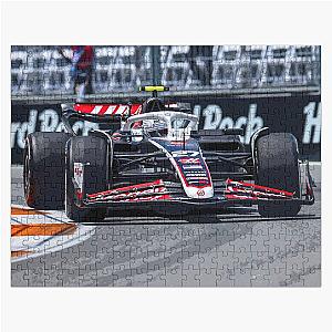 Nico Hulkenberg racing his 2024 F1 race car at the Miami Grand Prix