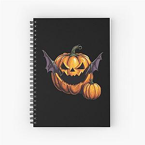 Halloween pumpkin eats a bat - tribute to Ozzy Osbourne Spiral Notebook