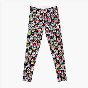 brightly colored sugar skulls on a black background Leggings