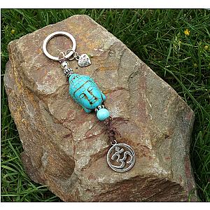 Keychain Buddha Pendant Buddha Head Turquoise White with Om Symbol Yoga Hindu Jaina Jainism India Flagship ET2101