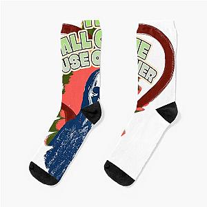 The Fall of the House of Usher Carla Gugino in a skull mask wears socks