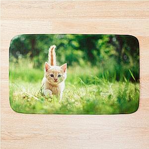 Little beautiful kitty cat in the garden says hey to you! Bath Mat