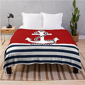 Nautical throw blanket with red white stripes and blue anchors on a red background.